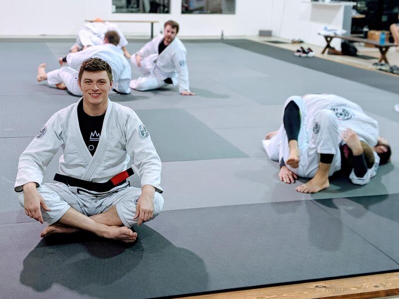 Spence Shaw in front of Brazilian Jiu Jitsu Fundamentals class.